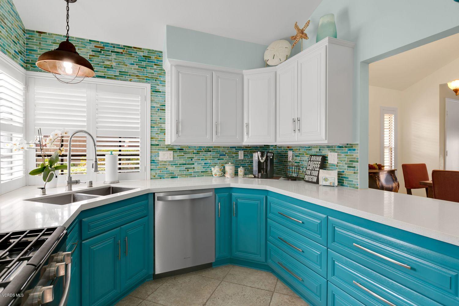 3736 Via Pacifica Walk Oxnard, CA 93035 - Photo 7 of 20 a kitchen with sink and cabinets