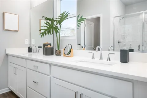 a bathroom with sink and a mirror
