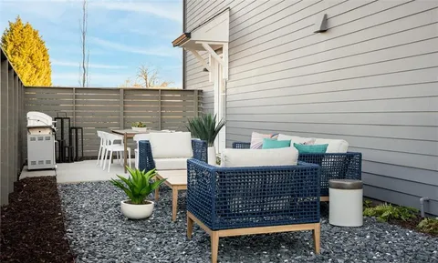 a view of outdoor sitting area with furniture