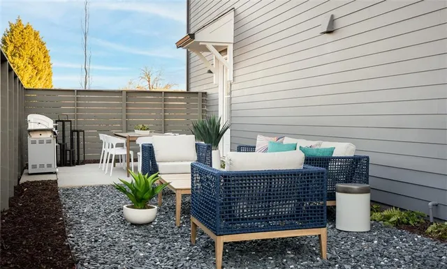 a view of outdoor sitting area with furniture