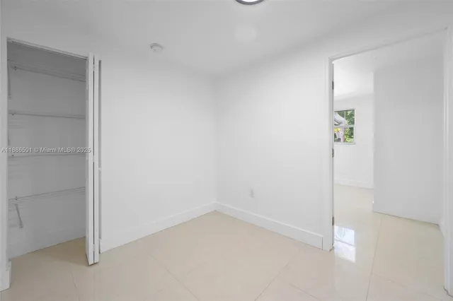 an empty room with an entryway