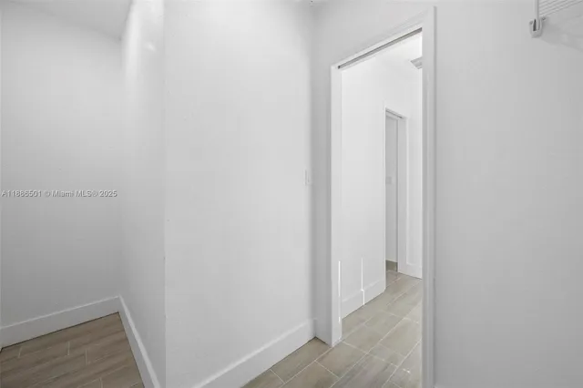 a view of a room with racks on the wall