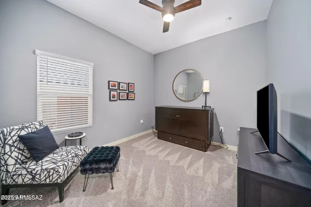 a bedroom with bed furniture and window