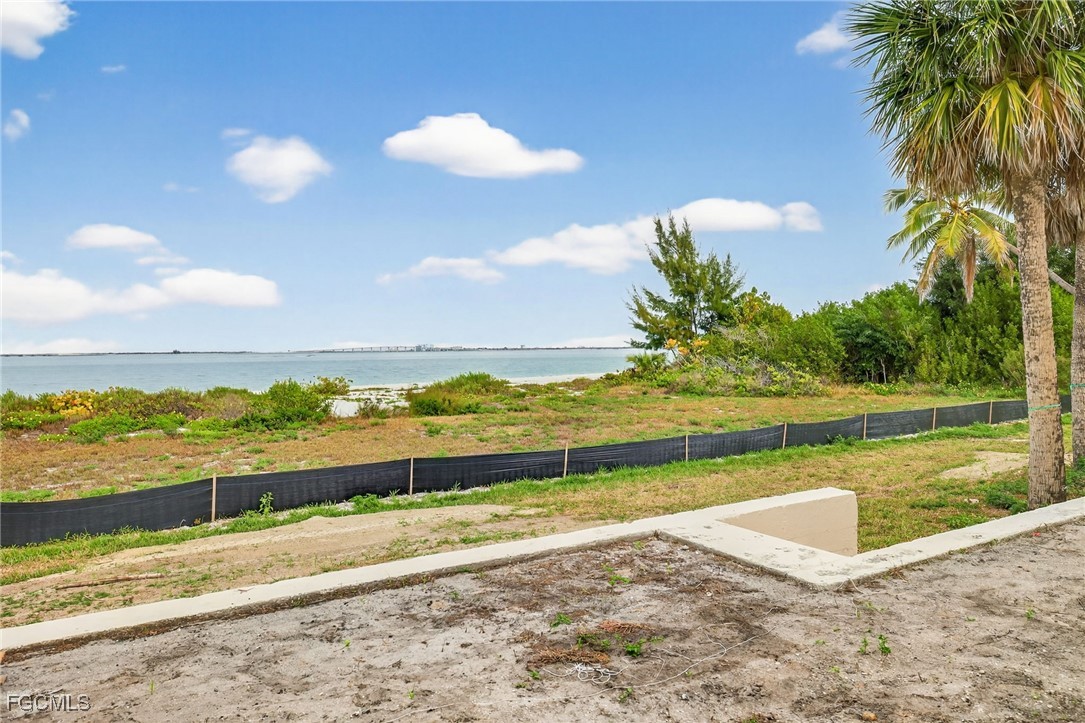 200 Periwinkle Way, Unit 124 Sanibel, FL 33957 - Photo 25 of 50 a view of an ocean and a mountain