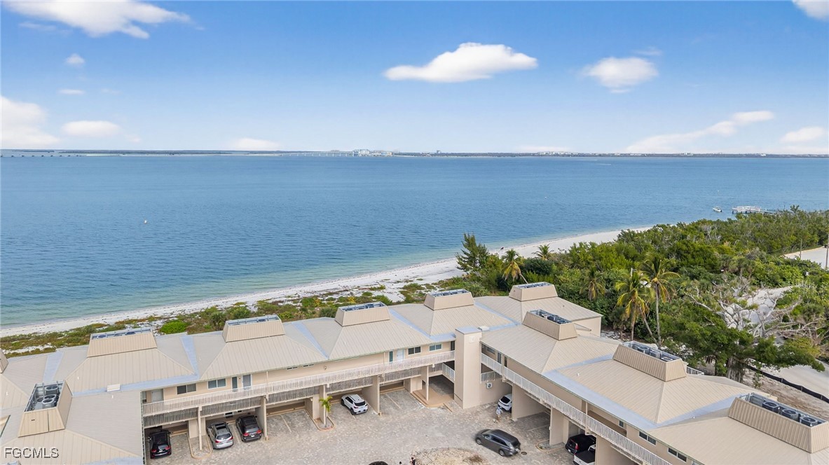 200 Periwinkle Way, Unit 124 Sanibel, FL 33957 - Photo 3 of 50 a view of a city with an outdoor seating and mountain view