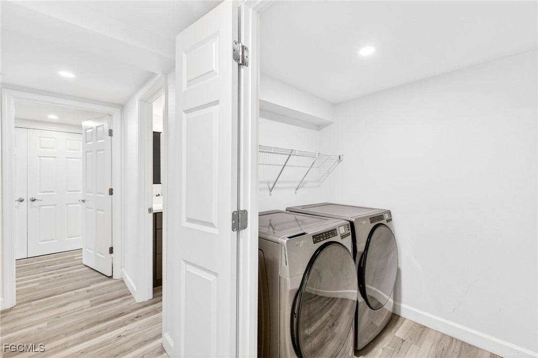 200 Periwinkle Way, Unit 124 Sanibel, FL 33957 - Photo 36 of 50 a view of entryway with washer and dryer