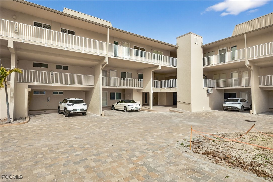 200 Periwinkle Way, Unit 124 Sanibel, FL 33957 - Photo 4 of 50 a view of a car garage