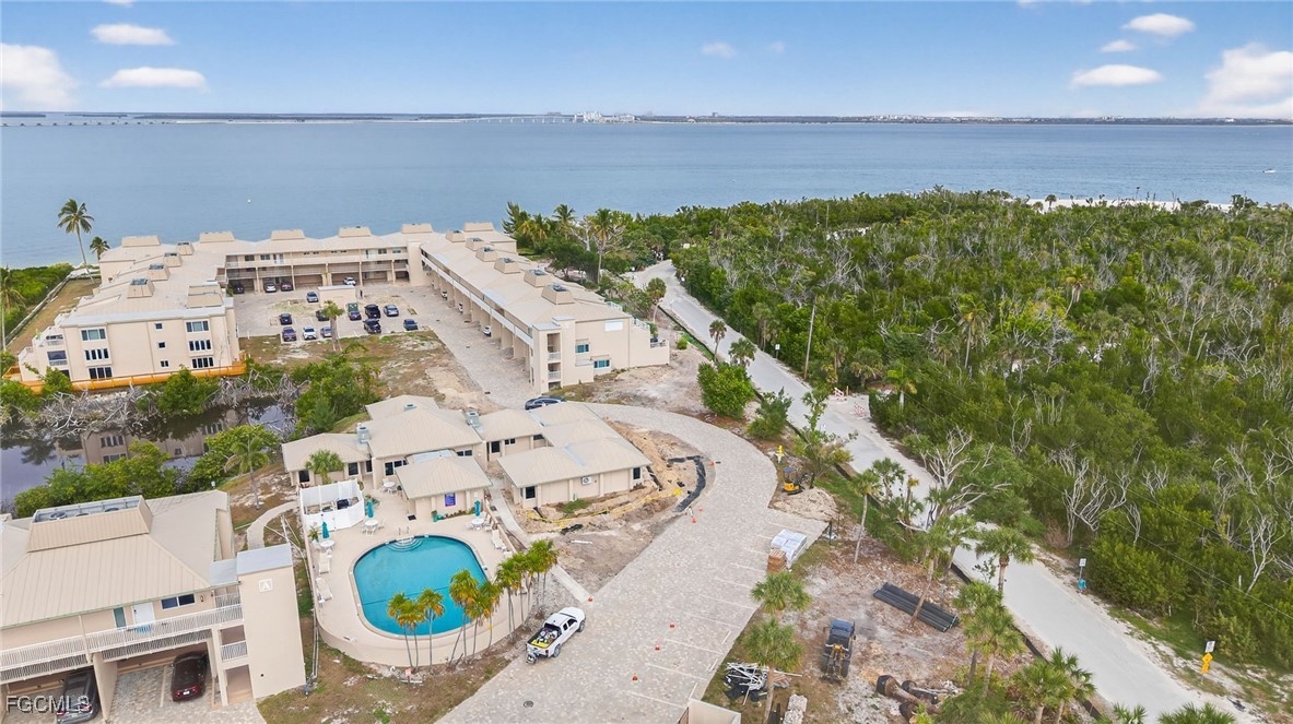 200 Periwinkle Way, Unit 124 Sanibel, FL 33957 - Photo 45 of 50 a aerial view of a house with a swimming pool