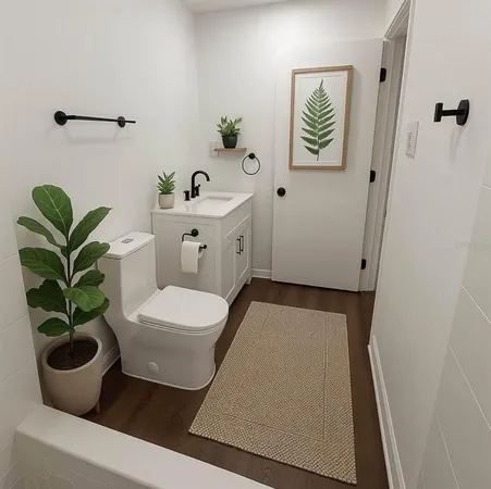 a bathroom with a toilet a sink and a window