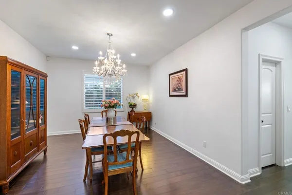 an empty room with wooden floor