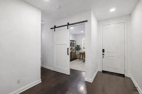 a workspace with furniture and a window