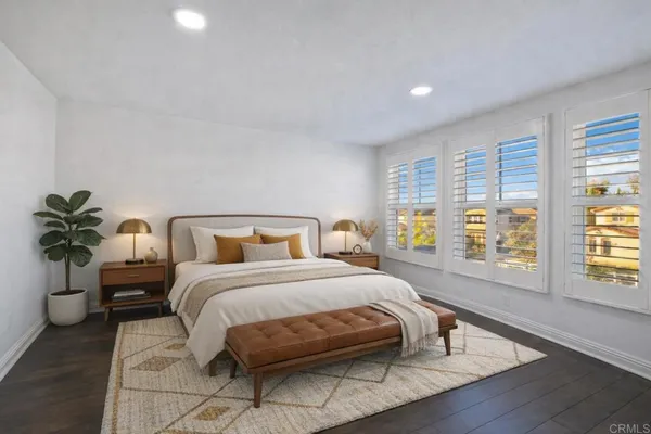 a view of a house with sitting area and garden