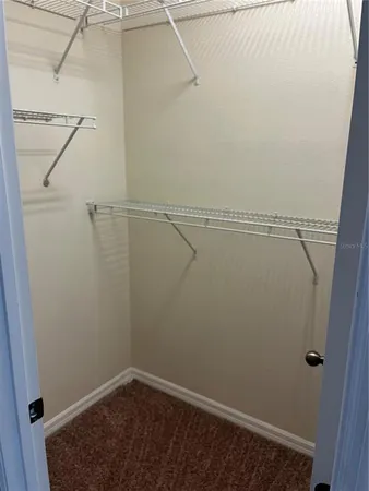 a view of small space with racks on the wall
