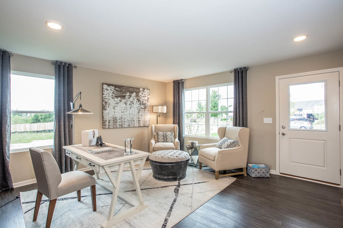 3818 Doherty Lane McHenry, IL 60050 - Photo 2 of 10 a living room with furniture and windows