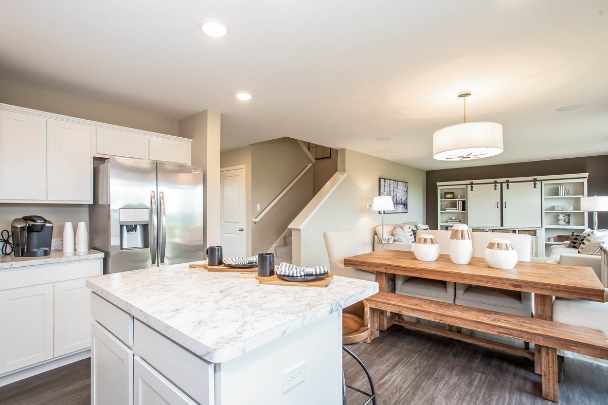 3818 Doherty Lane McHenry, IL 60050 - Photo 5 of 10 a room with stainless steel appliances kitchen island granite countertop a stove and cabinets