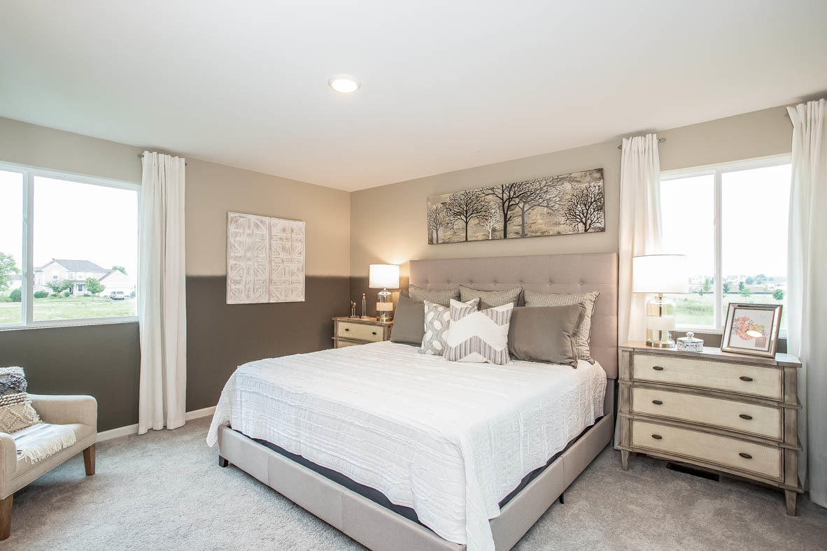 3818 Doherty Lane McHenry, IL 60050 - Photo 9 of 10 a bedroom with a bed and a window