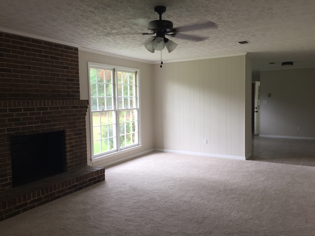5858 School Road Macon, GA 31216 - Photo 3 of 11 a view of empty room with a fireplace