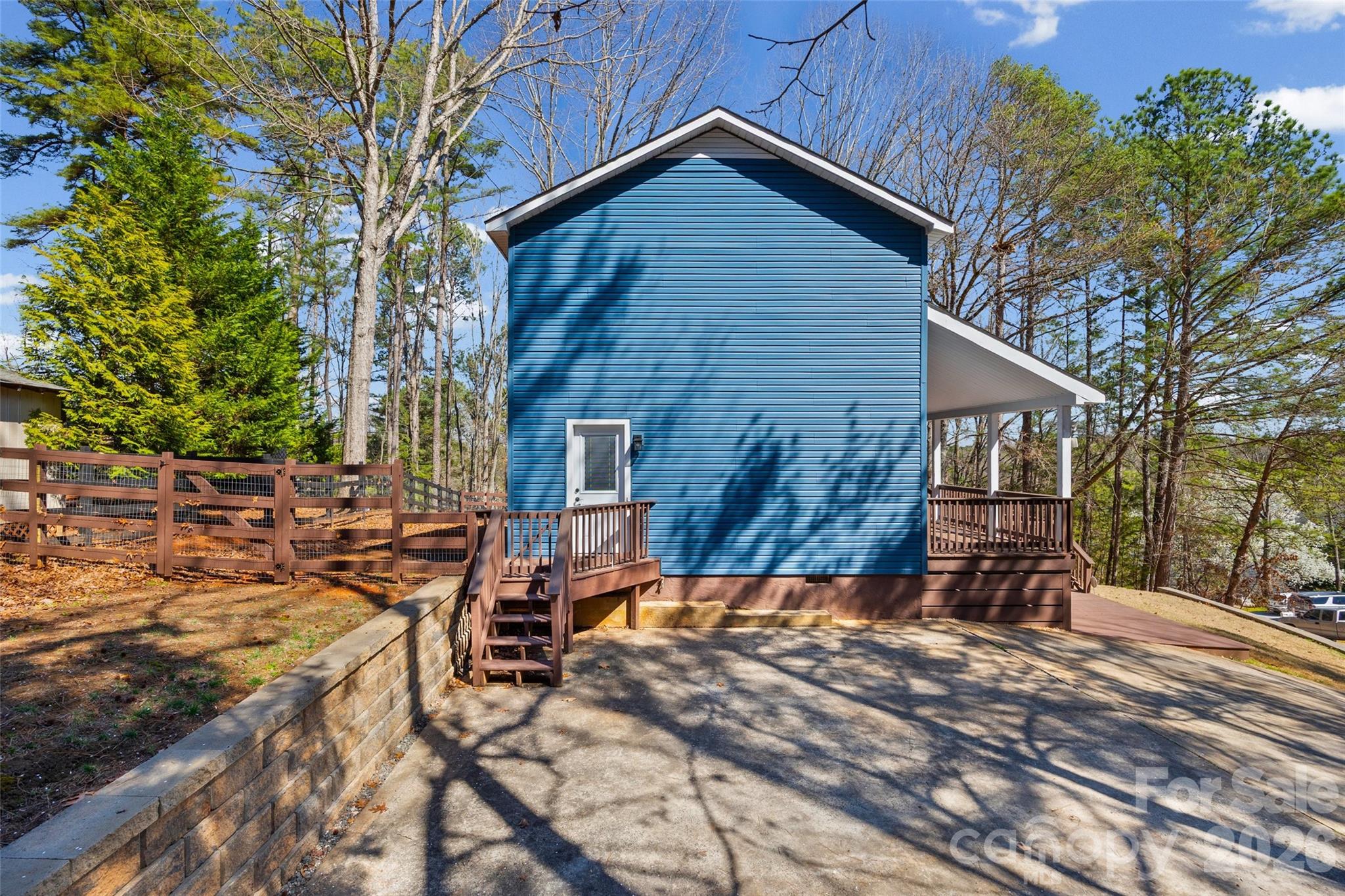 16149 Haroa Court Fort Mill, SC 29708 - Photo 25 of 43 a backyard of a house with barbeque oven and trees
