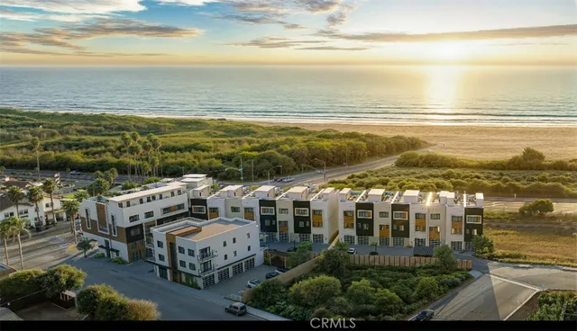 a view of an ocean with city