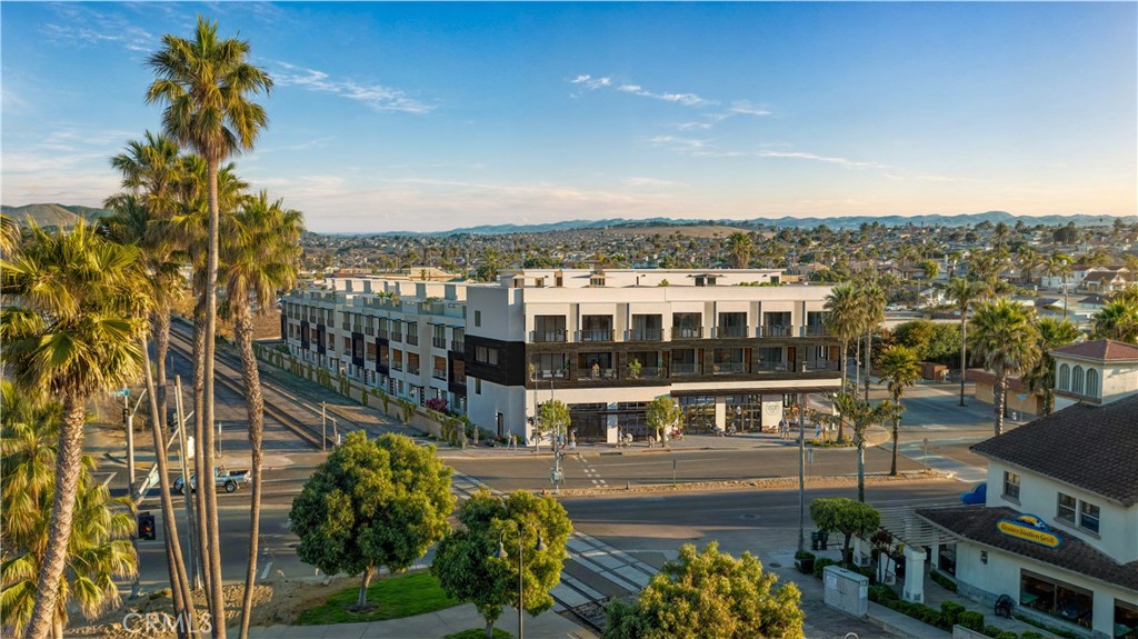 100 Ramona Avenue Grover Beach, CA 93433 - Photo 11 of 23 a view of a city that has tall buildings
