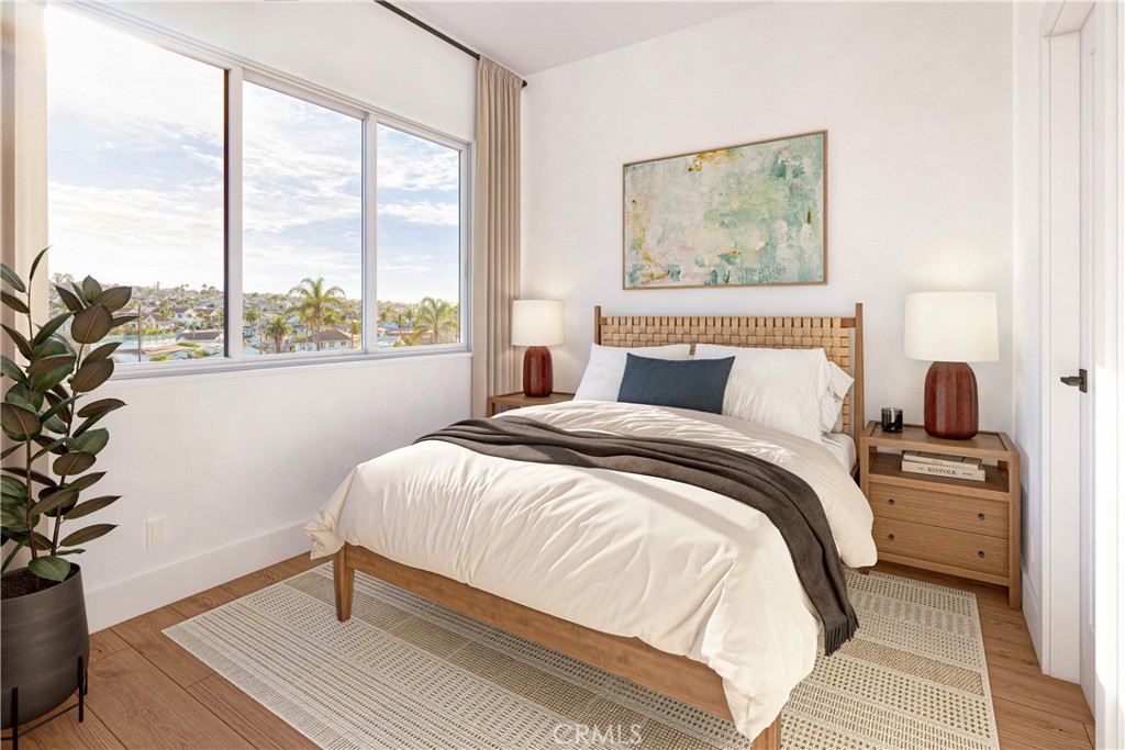 100 Ramona Avenue Grover Beach, CA 93433 - Photo 19 of 23 a bedroom with a bed and a window