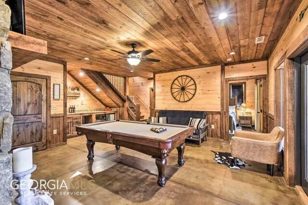 a room with table and chairs