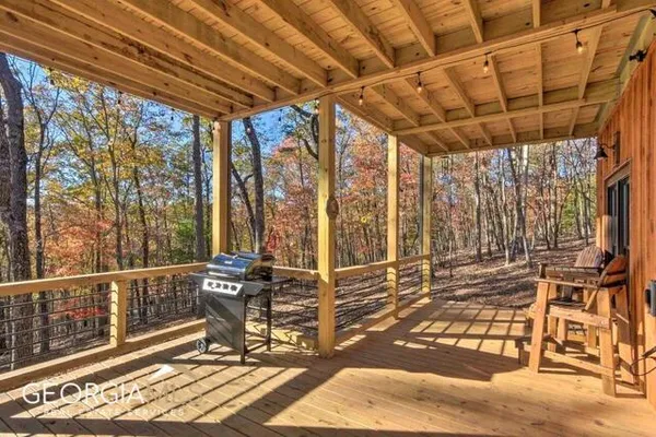 a view of a balcony with chairs
