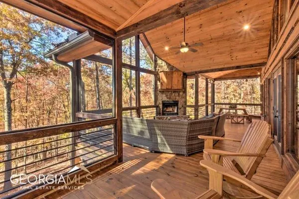 a living room with large windows