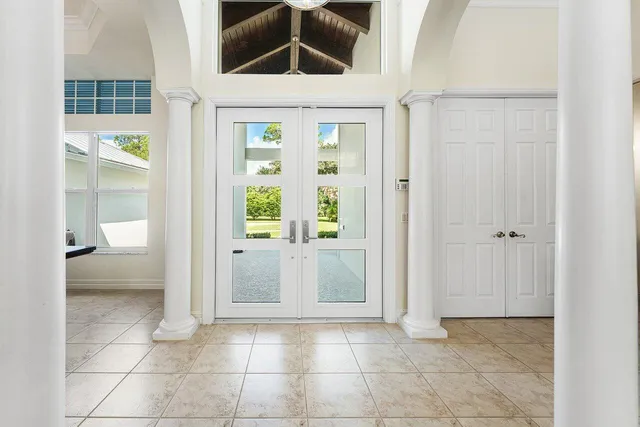 a living room with furniture and flat screen tv