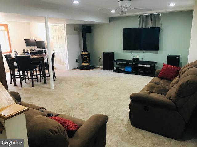 92 Crestmont Court Lititz, PA 17543 - Photo 27 of 33 Finished Basement with Gas Pot-Belly Stove