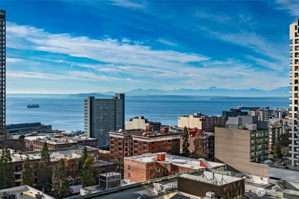a view of a city with ocean
