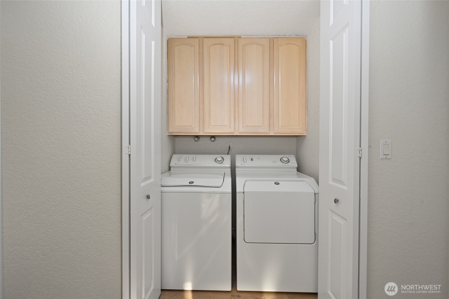 2100 3rd Avenue, Unit 1502 Seattle, WA 98121 - Photo 13 of 31 a utility room with dryer and washer