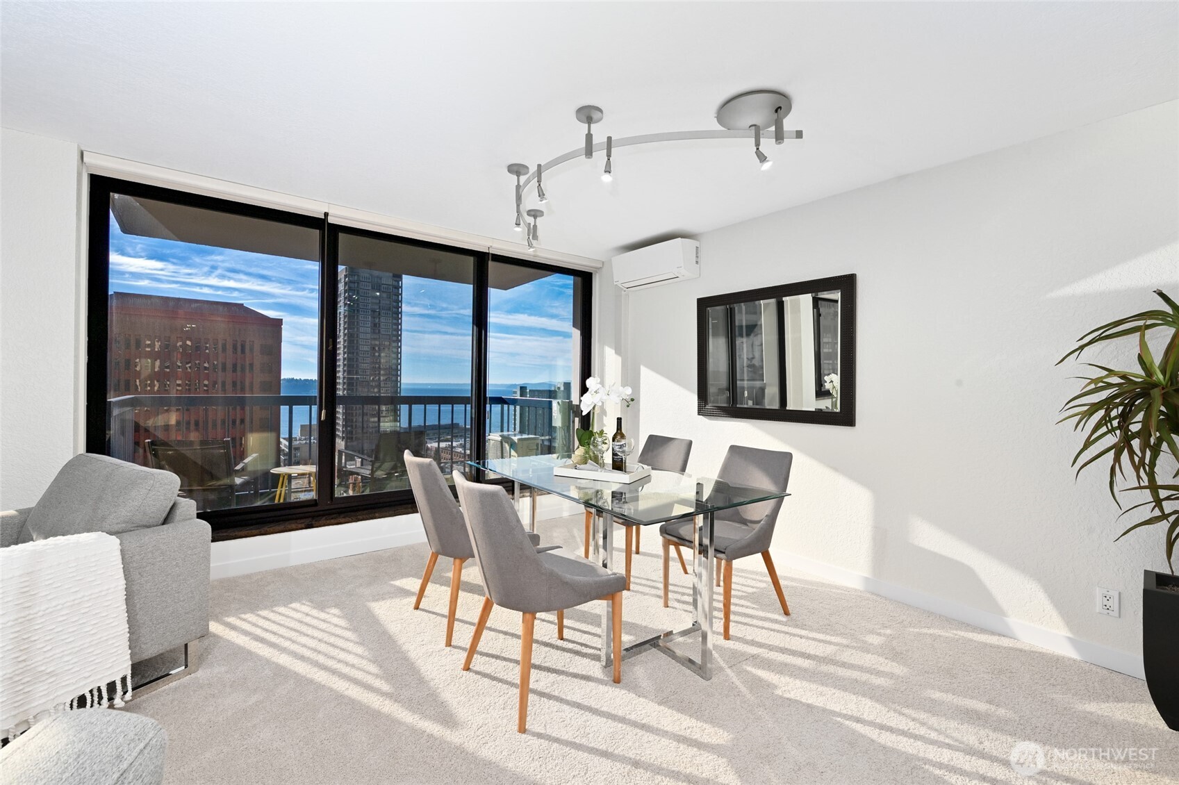 2100 3rd Avenue, Unit 1502 Seattle, WA 98121 - Photo 2 of 31 a view of a dining room with furniture window and outside view