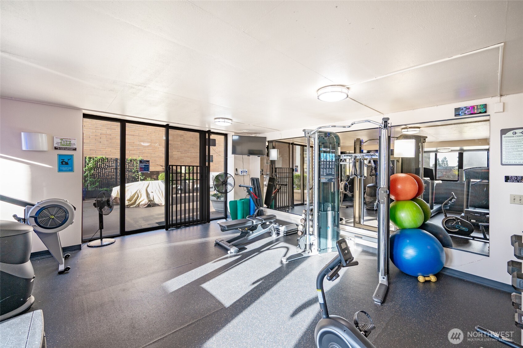 2100 3rd Avenue, Unit 1502 Seattle, WA 98121 - Photo 27 of 31 a room with gym equipment