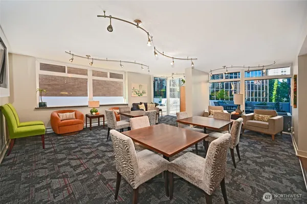a outdoor space with lots of furniture and windows