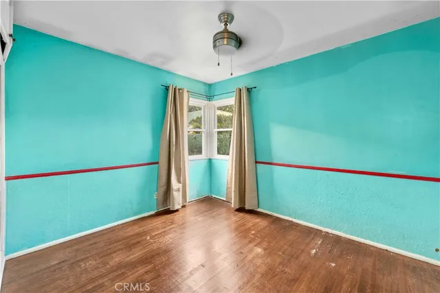 a view of a room with a large window