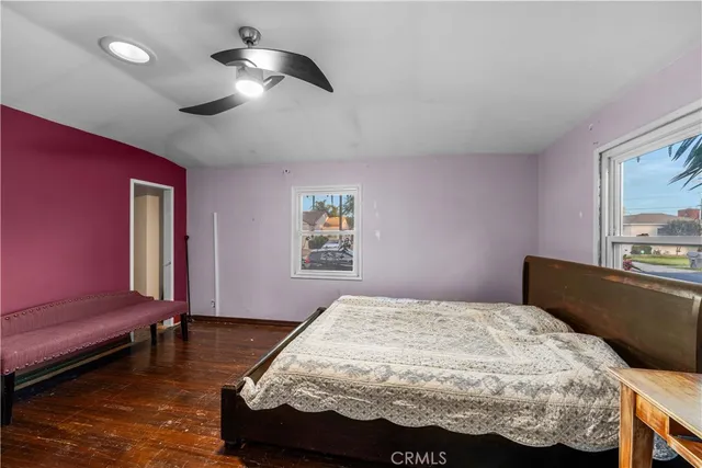 a bathroom with a sink a toilet and shower curtain