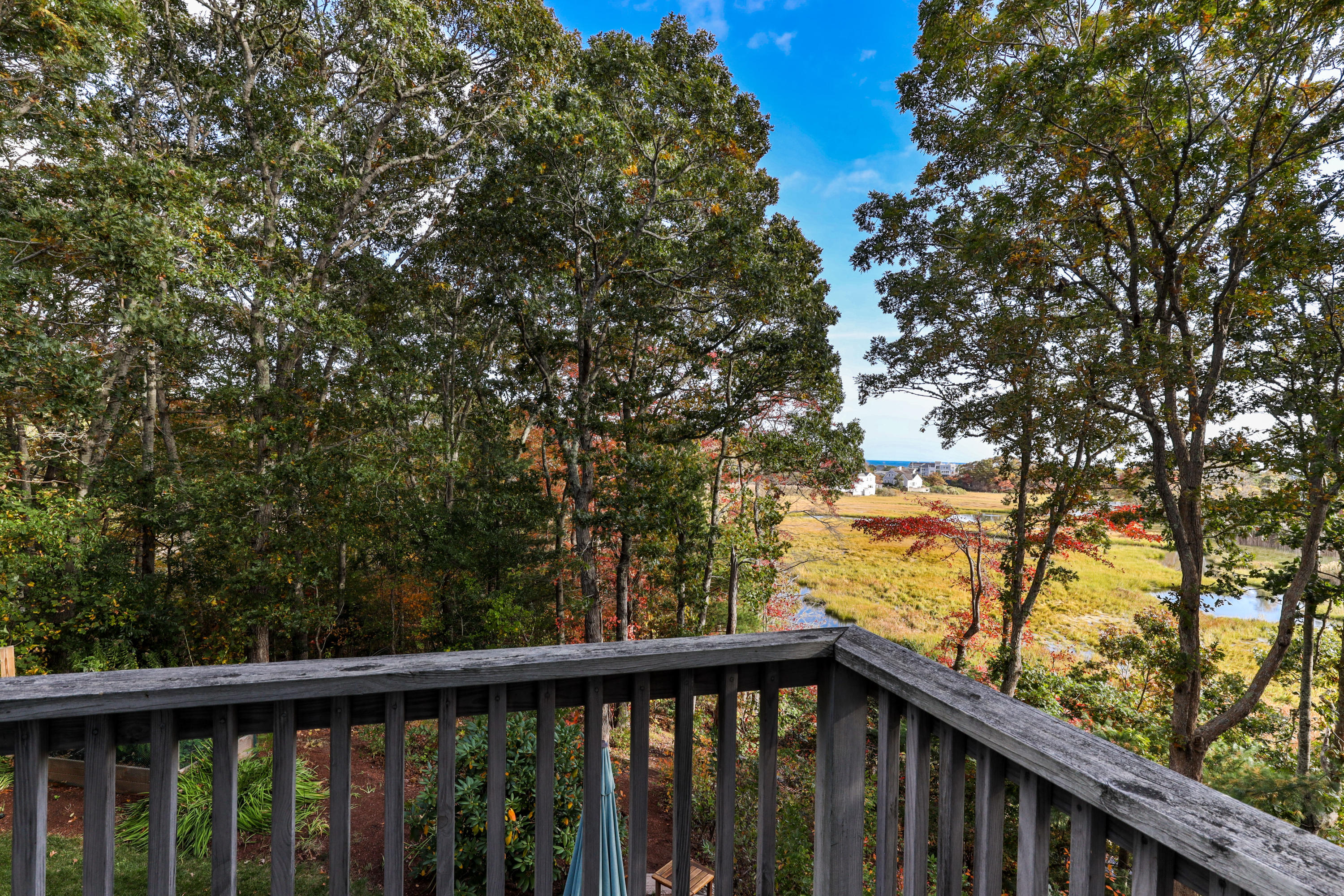 461 South Main Street Centerville, MA 02632 - Photo 23 of 52 a view of a balcony with trees