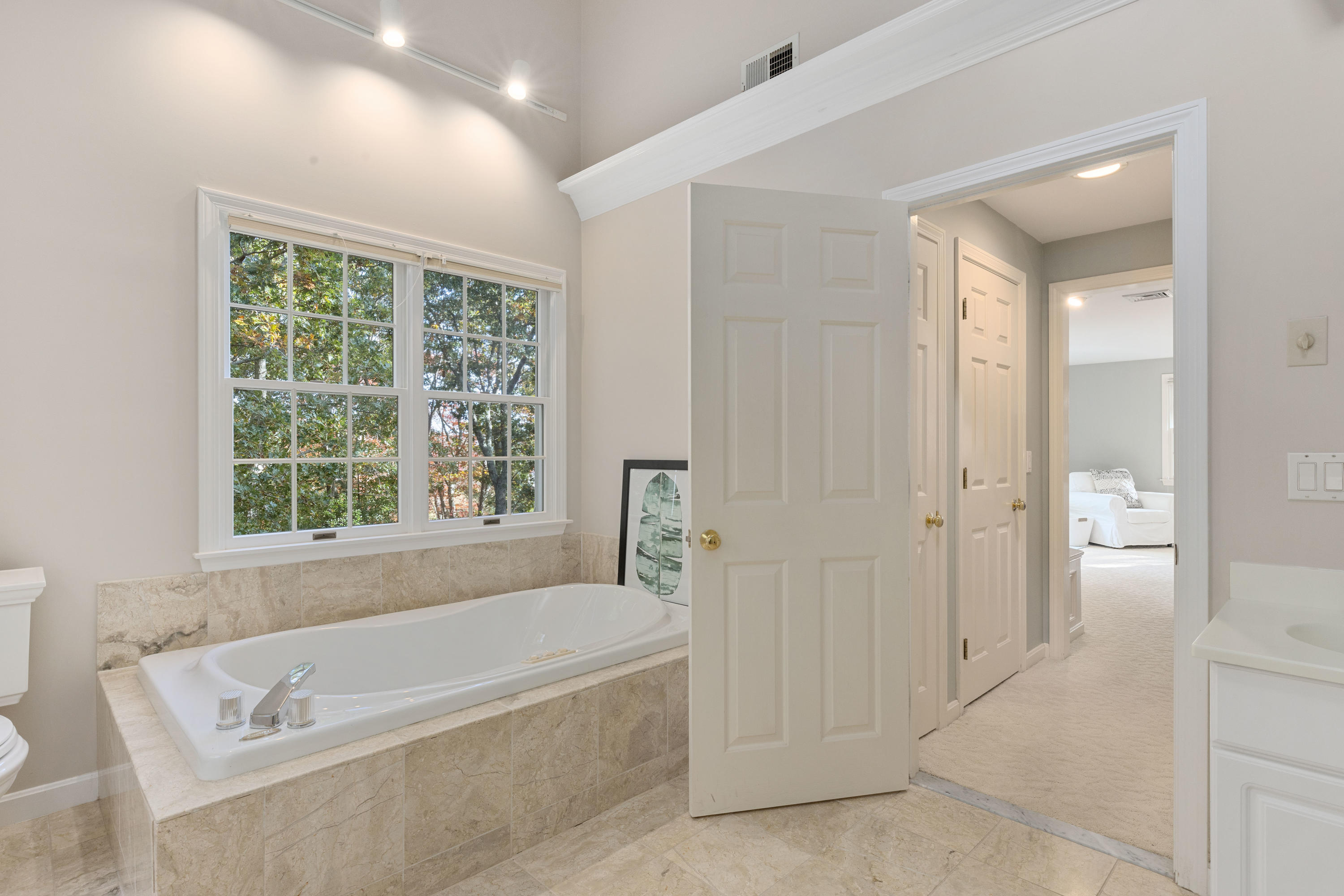 461 South Main Street Centerville, MA 02632 - Photo 26 of 52 a bathroom with a tub shower and sink