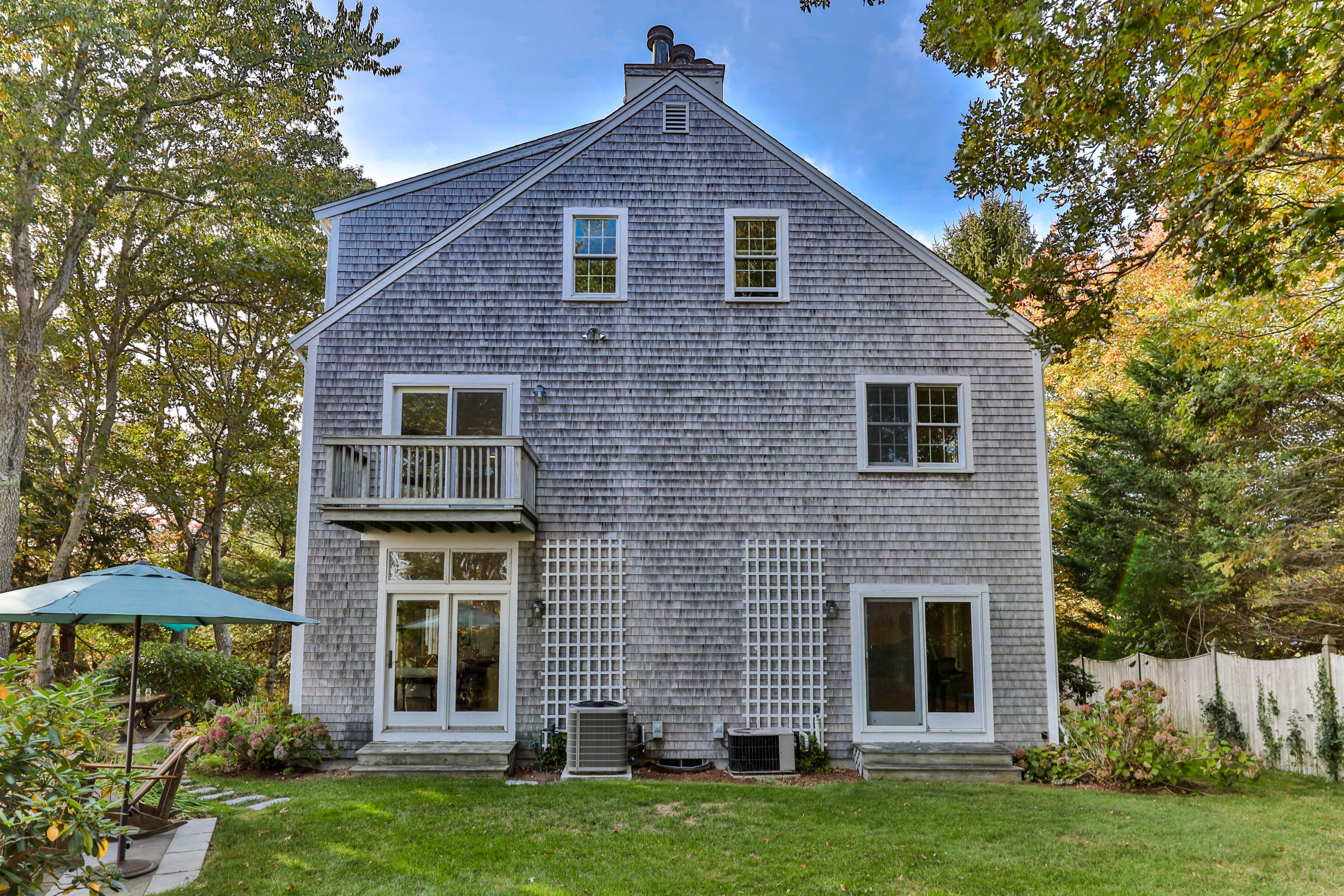 461 South Main Street Centerville, MA 02632 - Photo 47 of 52 a front view of a house with garden