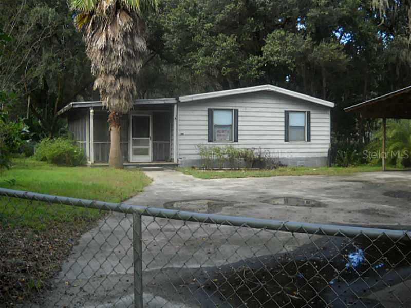 462 Old Welcome Road Lithia, FL 33547 - Photo 1 of 1 Exterior Front - Fenced yard