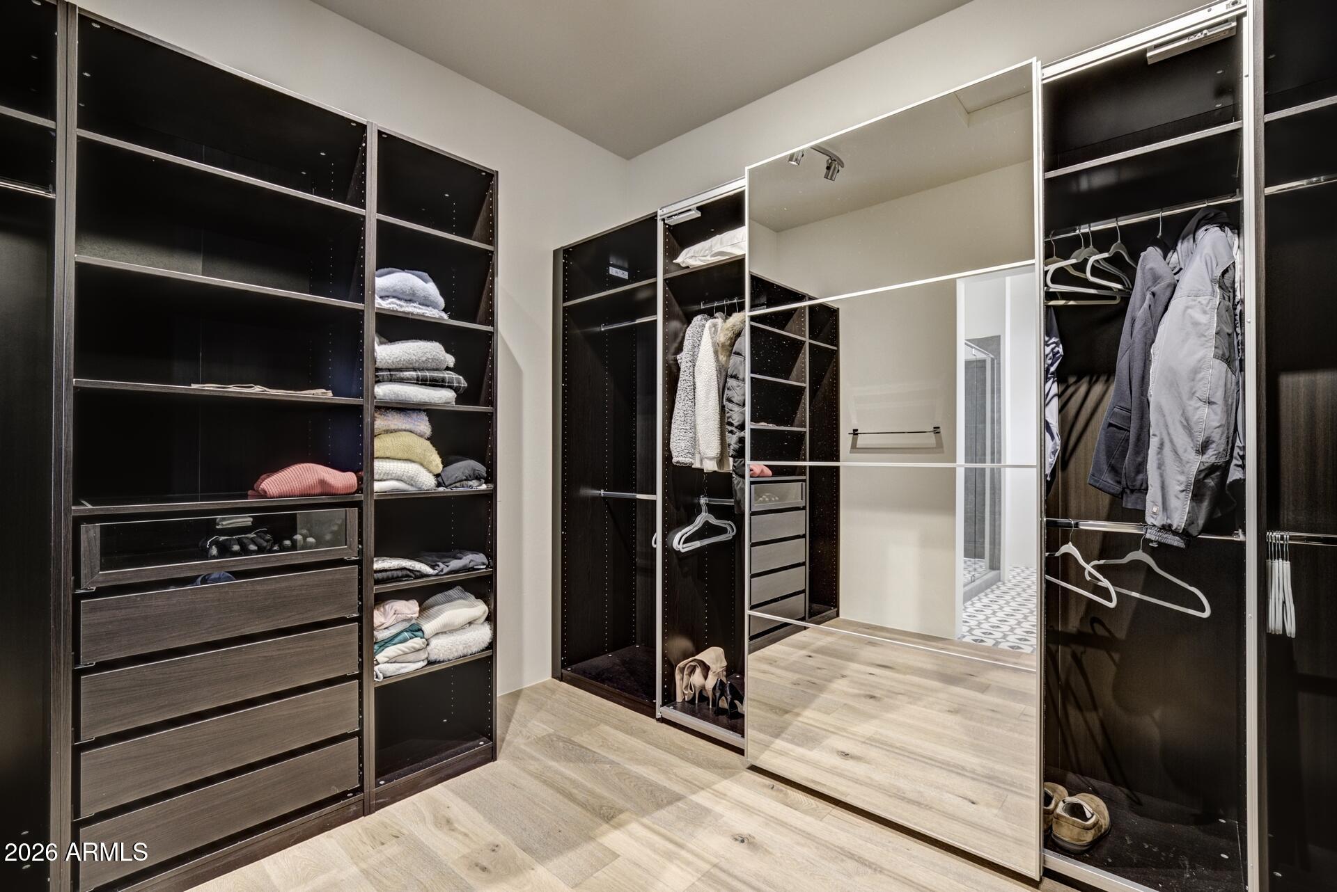 610 South Valhalla Payson, AZ 85541 - Photo 15 of 37 a view of walk in closet with clothes and shoes