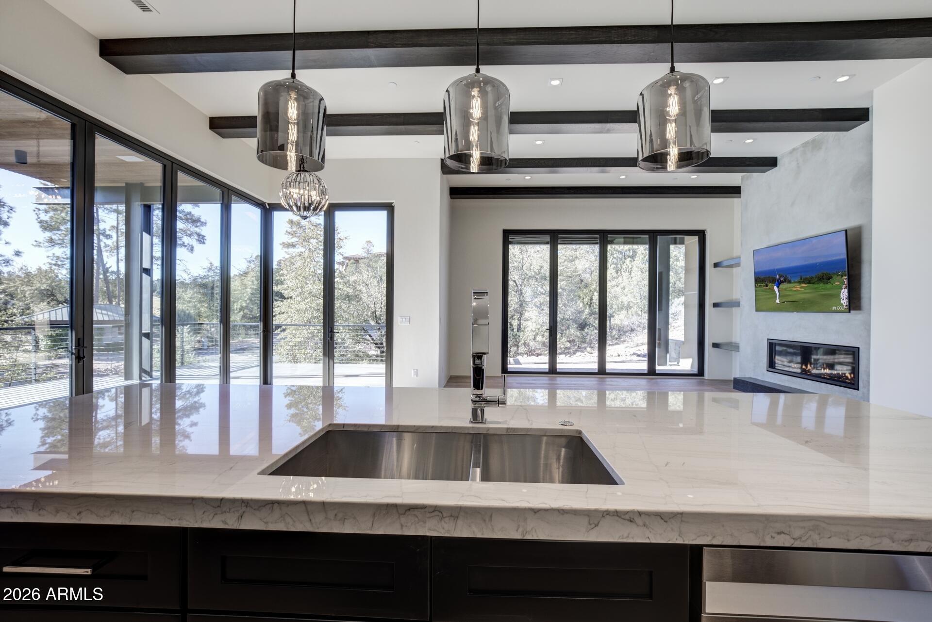 610 South Valhalla Payson, AZ 85541 - Photo 2 of 37 a kitchen with a sink a counter top space and living room