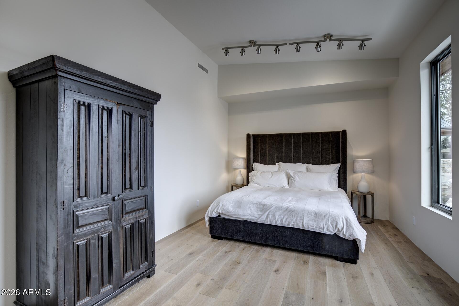 610 South Valhalla Payson, AZ 85541 - Photo 23 of 37 a bedroom with a bed and a window