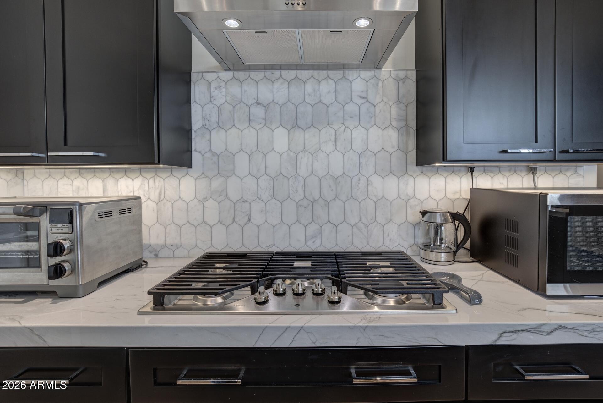 610 South Valhalla Payson, AZ 85541 - Photo 29 of 37 a stove top oven sitting inside of a kitchen