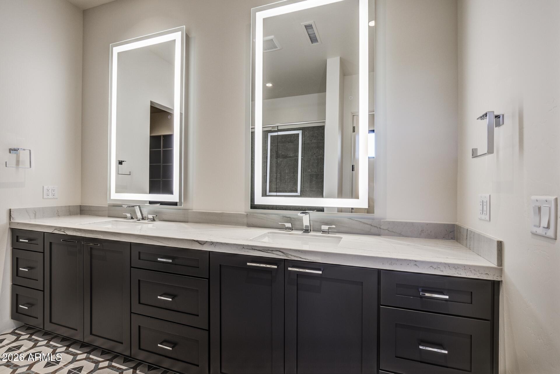 610 South Valhalla Payson, AZ 85541 - Photo 34 of 37 a bathroom with double sink and a mirror