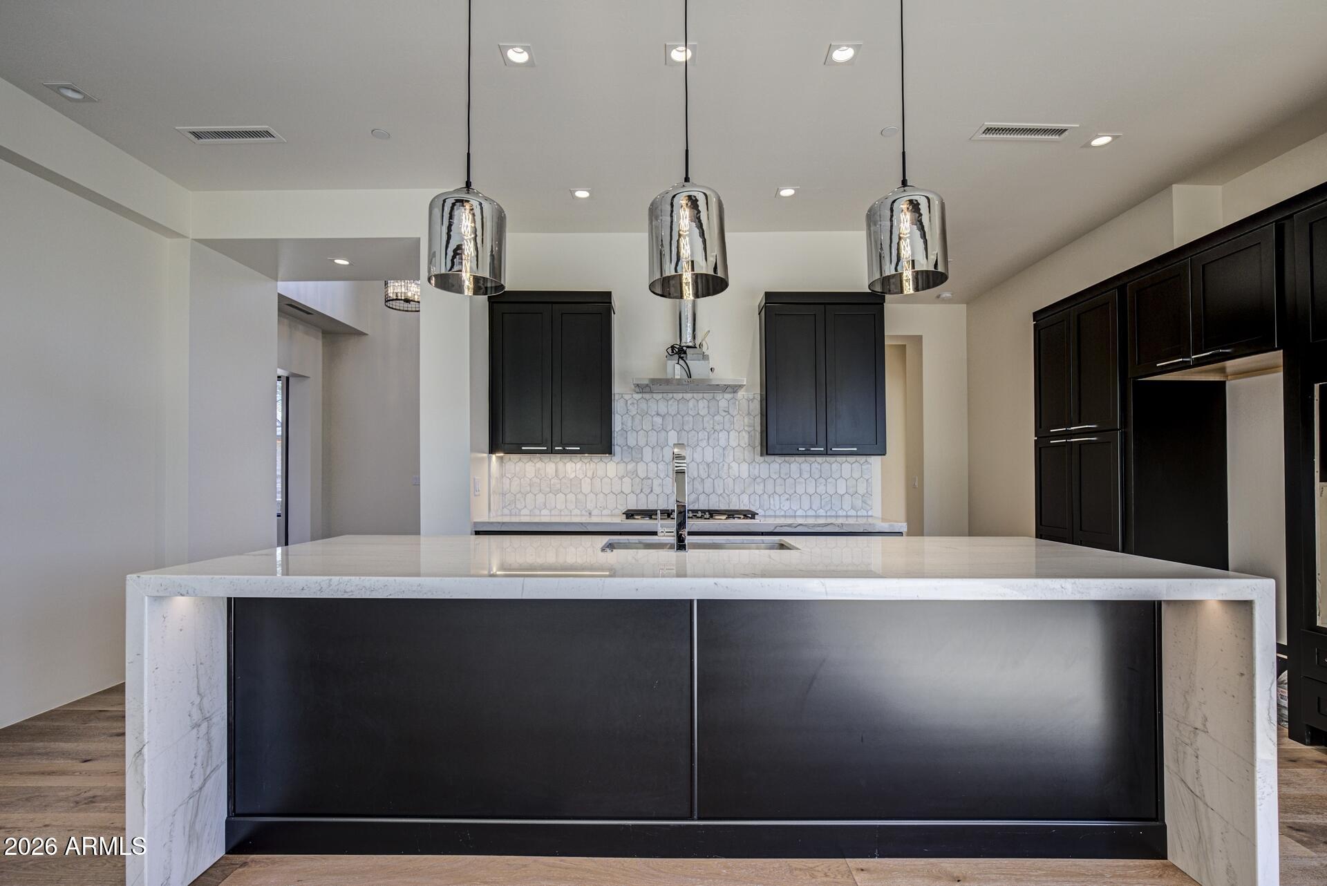 610 South Valhalla Payson, AZ 85541 - Photo 5 of 37 a kitchen with a sink a counter top space and cabinets