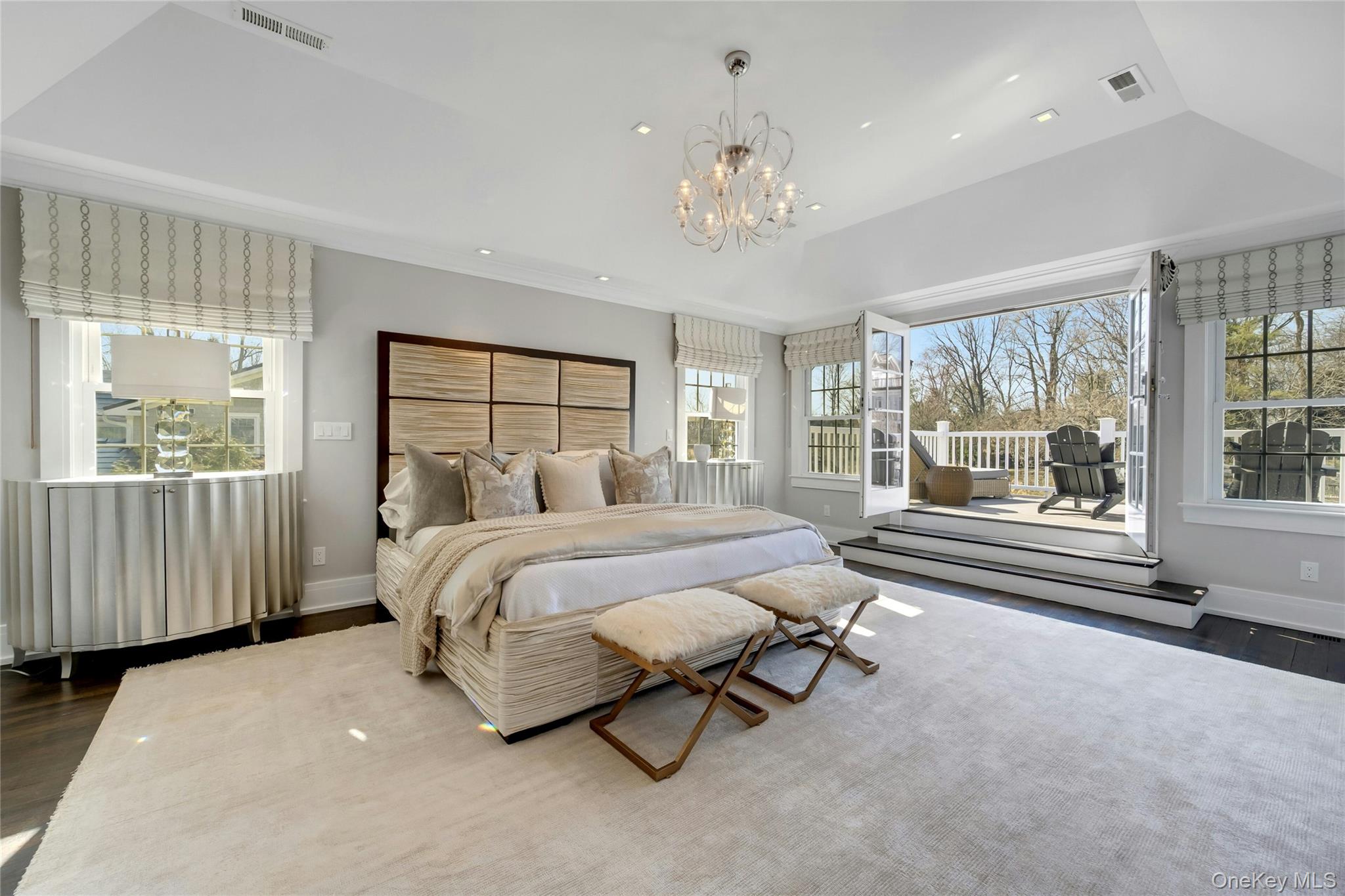 44 Brevoort Lane Rye, NY 10580 - Photo 14 of 32 Wake up to breathtaking water views from this expansive sanctuary featuring a walk-out terrace and THREE oversized walk-in closets designed by California closets
