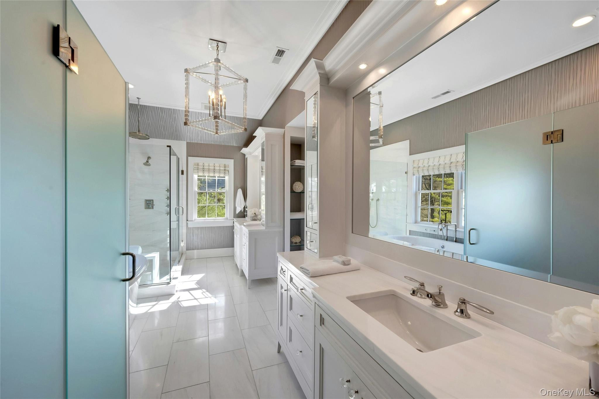 44 Brevoort Lane Rye, NY 10580 - Photo 15 of 32 Spa-inspired primary bath with Bain Ultra massage tub, over sized seven-jet spa shower for a true meditative home spa experience