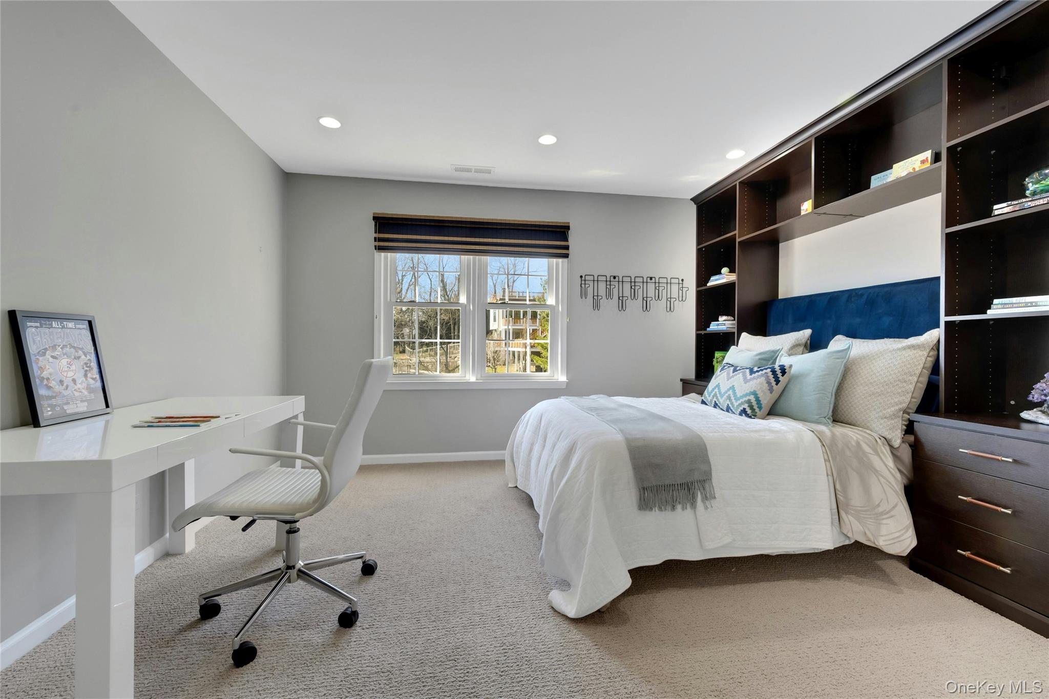44 Brevoort Lane Rye, NY 10580 - Photo 18 of 32 Bedroom with custom built-ins and room for a study area